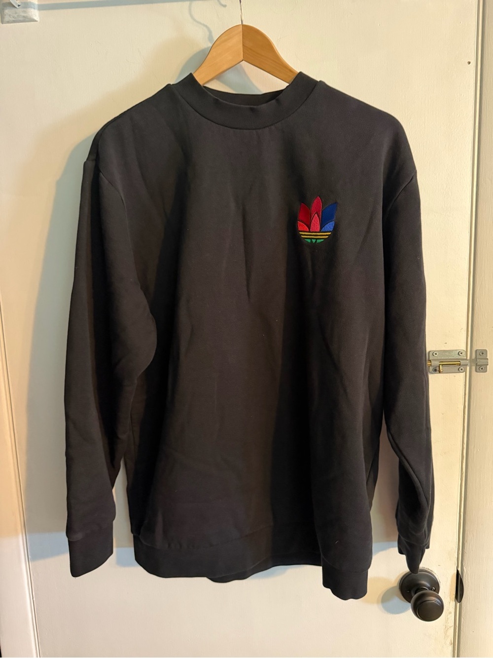 ADIDAS Men’s Black Crewneck Sweater with Colorful Chest Emblem, Size Medium